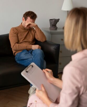 front-view-man-undergoing-therapy_23-2150229933