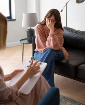 front-view-woman-therapy_23-2150229934